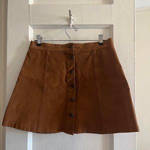Mink Pink faux suede button up mini skirt.